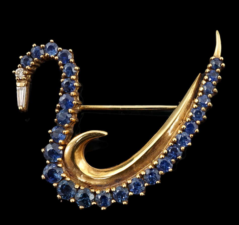 A 1990's 18ct gold, sapphire and diamond cluster brooch, modelled as a swan